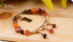 Load image into Gallery viewer, bhavaa Premium Gemstone Jewelry- Bracelet. Rustic Elegance Collection, Mark-2 | Gemstones: Orange Crab Agate, Agate Faceted, Orange Dream Fire Dragon Veins Agate, Orange Jade, Brown Tigereye Faceted
